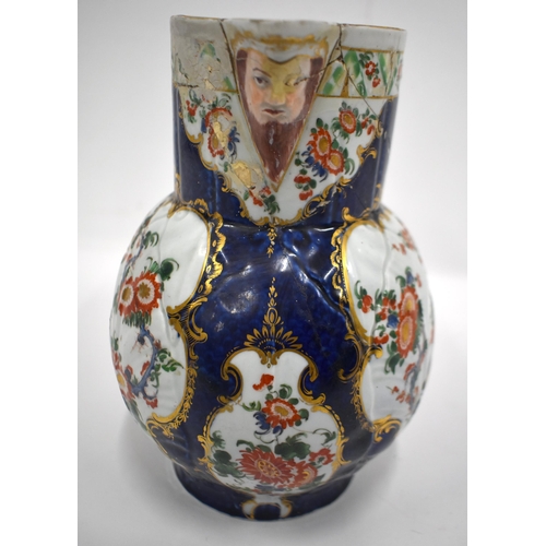 183 - 18th century Worcester mask jug painted in kakiemon style with two panels one with flowers, the othe... 