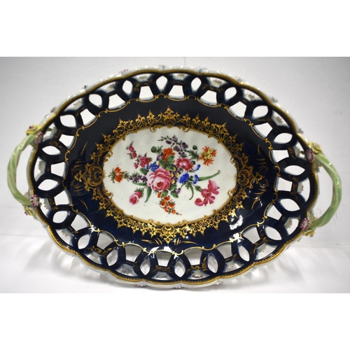 187 - 18th century Worcester two handled oval basket painted with flowers on a wet blue ground 9.5cm high ... 