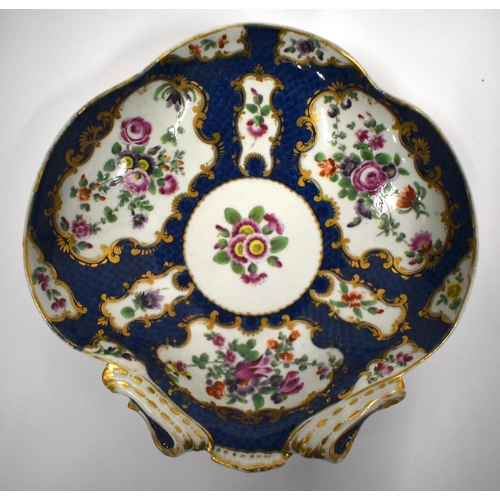 192 - 18th century Worcester shell shaped dish painted with flower on a blue scale ground and a similar si... 