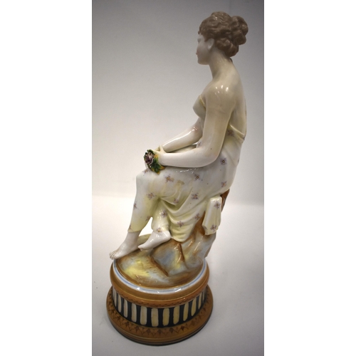 194 - 19th century porcelain figure of a girl sitting on a plinth, wave mark in blue to base, probably Roy... 