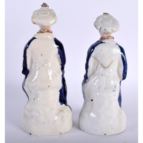 19 - A PAIR OF 19TH CENTURY STAFFORDSHIRE FIGURES OF TURKS. 21 cm high.