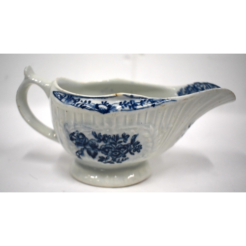 201 - 18th century Lowestoft good oval flute-moulded sauce boat the loop handle with upright thumb rest, p... 