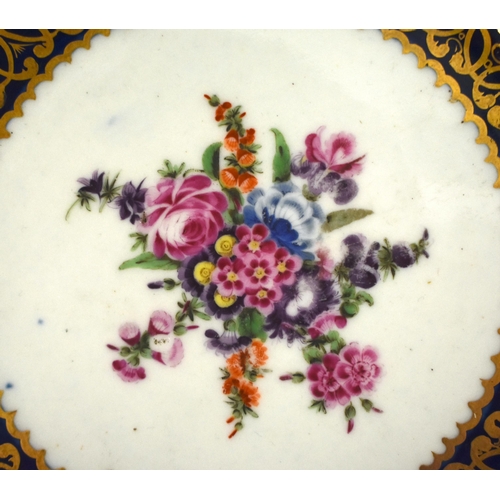 207 - 18th century Worcester fine pair of plates painted with flowers surrounded by elaborate gilding and ... 