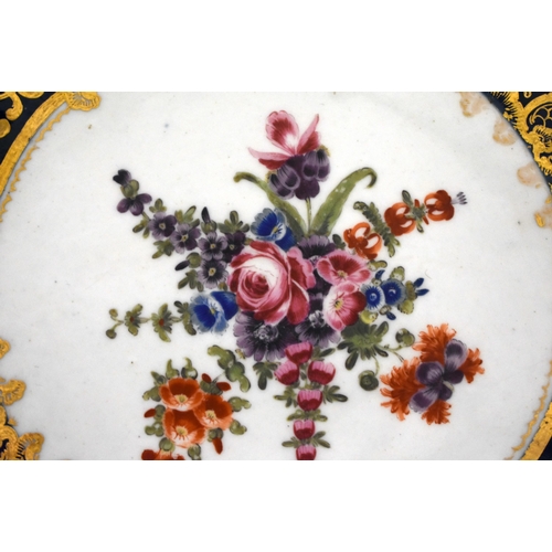 208 - 18th century Worcester fine deep dish painted with flowers surrounded by elaborate gilding and a wet... 