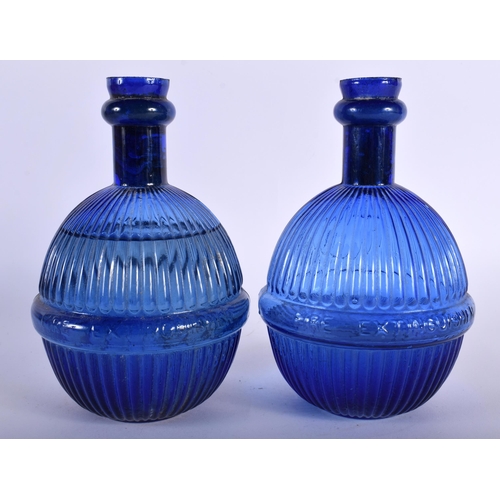 21 - TWO STAR BLUE GLASS GRENADE FIRE EXTINGUISHERS. 18 cm x 8 cm. (2) Note: We are unable to ship this l... 