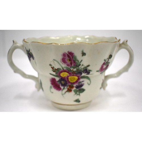 213 - 18th century Worcester chocolate or caudle and stand painted with British garden flowers. Cup 7cm hi... 