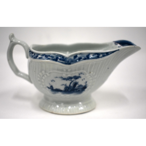 215 - 18th century Worcester sauce boat of strap moulded form painted with the Little Fisherman pattern, w... 