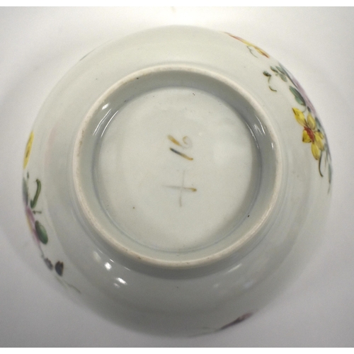 217 - 18th century Bristol bowl painted with flowers under a brown line rim X` 16 mark. 12cm diameter