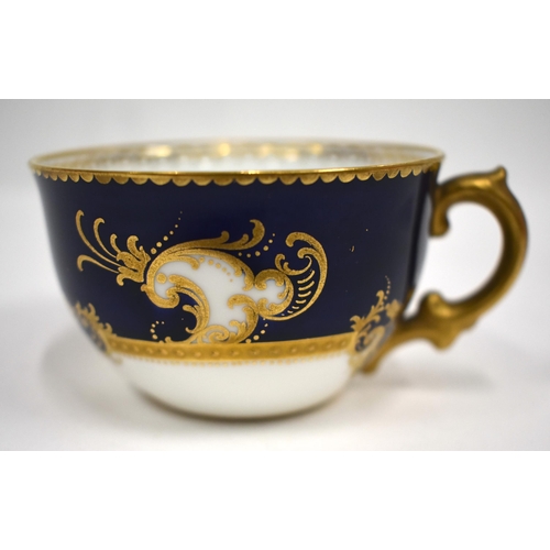 220 - Royal Crown Derby tea service with cobalt blue ground and gilt initials comprising bread and butter ... 