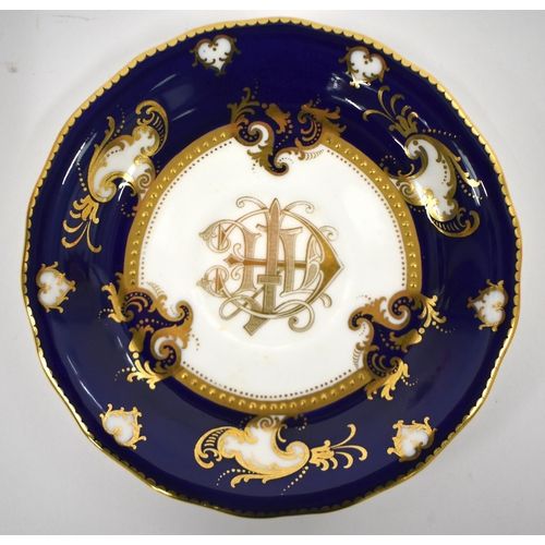 220 - Royal Crown Derby tea service with cobalt blue ground and gilt initials comprising bread and butter ... 