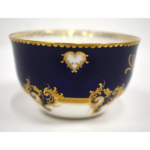 220 - Royal Crown Derby tea service with cobalt blue ground and gilt initials comprising bread and butter ... 