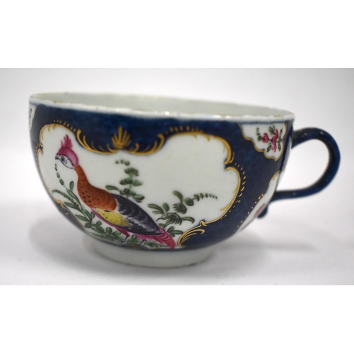 234 - 18th century Worcester teacup and saucer painted with a Big Eyed Birds in mirror panels on a blue ... 