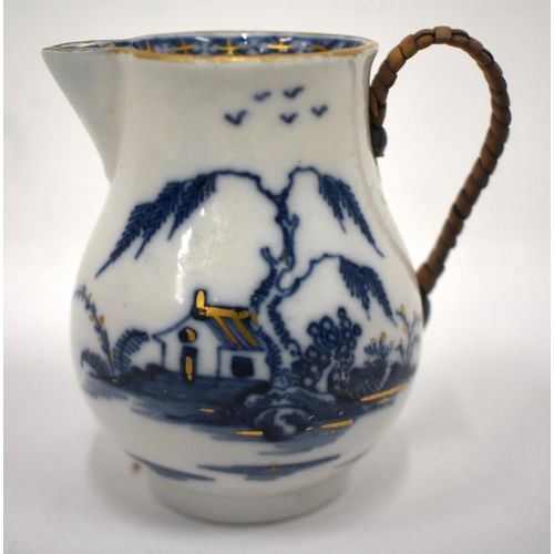 236 - Plymouth or early Bristol sparrow beak jug painted with a house on an island in underglaze blue, X m... 