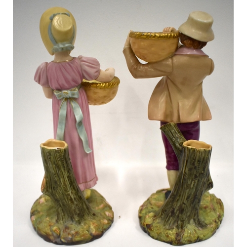 242 - Royal Worcester pair of basket carriers painted in Raphaelesque colours date mark 1883. 25cm high