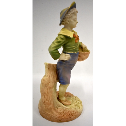 245 - Royal Worcester figure of a boy with a basket and a broad brimmed hat painted in shot enamels shape ... 