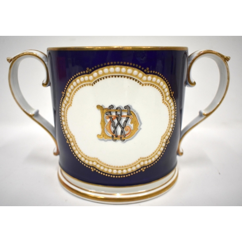 247 - Late 19th century Grainger Worcester two handled loving cup finely painted with a view of Worcester ... 