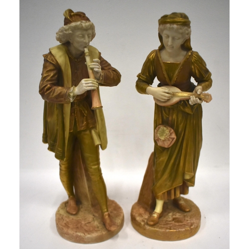 253 - Royal Worcester figures of musicians modelled by James Hadley, a lady playing the mandolin, the man ... 