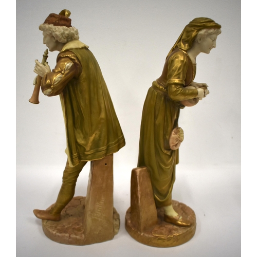 253 - Royal Worcester figures of musicians modelled by James Hadley, a lady playing the mandolin, the man ... 