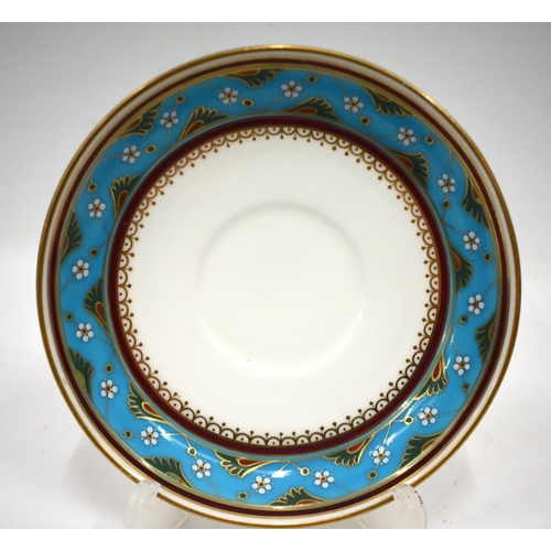 255 - Late 19th century Minton turquoise bordered coffee cup and saucer, in the style of Sir Christopher D... 