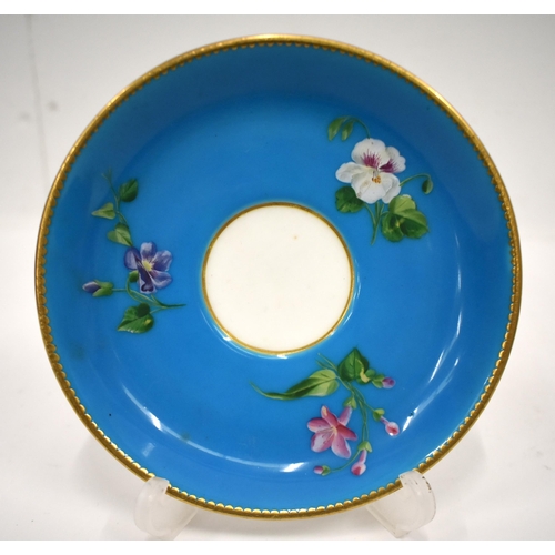 257 - Late 19th century Minton fine turquoise ground teacup and saucer thickly enameled with colourful flo... 