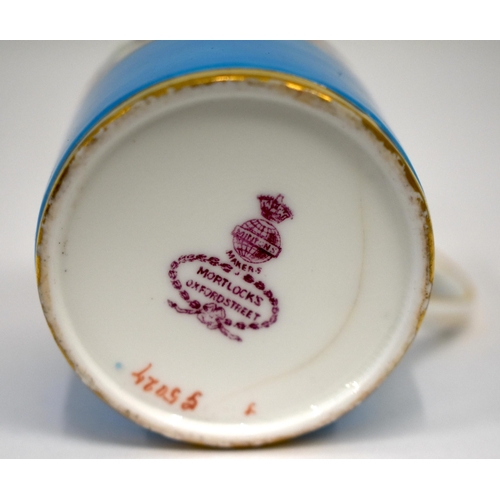 258 - Late 19th century Minton fine turquoise ground coffee can and saucer painted with a wide floral chai... 