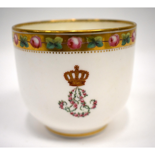 259 - Minton cup and saucer each piece with a gilt and red coronet above floral painted initials 