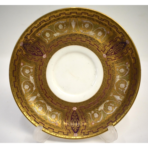 262 - Late 19th/early 20th century Coalport rare coffee cup and similar Minton saucer highly gilded, richl... 