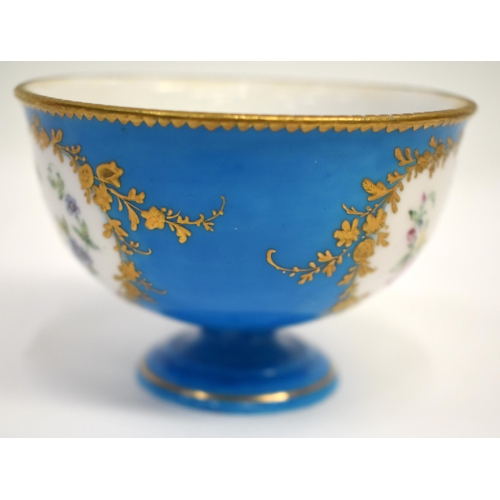 266 - Late 18th century Sevres small footed bowl, painted with two large panels of flowers reserved in rai... 