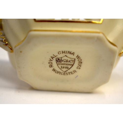 275 - Late 19th century Grainger & Co. two handled reticulated box and cover, printed shield mark to base ... 