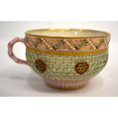 280 - Late 19th century Royal Worcester double walled reticulated tea cup with jewelled rim and foot rim p... 