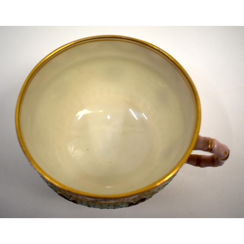 280 - Late 19th century Royal Worcester double walled reticulated tea cup with jewelled rim and foot rim p... 