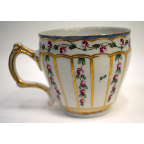 283 - 18th century Bristol coffee cup and saucer painted with rose chains in gilt panels, X in blue; 5. in... 