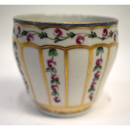 283 - 18th century Bristol coffee cup and saucer painted with rose chains in gilt panels, X in blue; 5. in... 