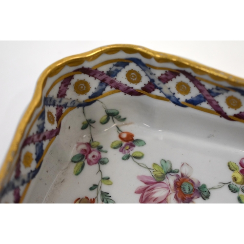 287 - 18th century Bristol canted square dish lavishly painted with flowers under a puce and blue entwined... 