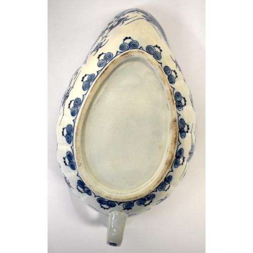 292 - 18th century Worcester sauce boat painted with the Doughnut Tree pattern. 20.5cm long