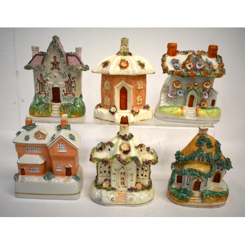 298 - Six Staffordshire pottery cottages