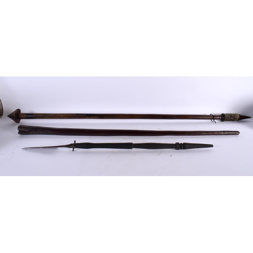 322 - TWO ANTIQUE TRIBAL FIJIAN IRON WOOD STAFFS together with another tribal spear. Largest 110 cm long. ... 