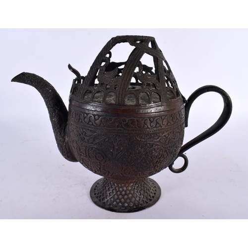 327 - A VERY UNUSUAL 18TH/19TH CENTURY MIDDLE EASTERN RETICULATED ISLAMIC TEAPOT with openwork top encasin... 