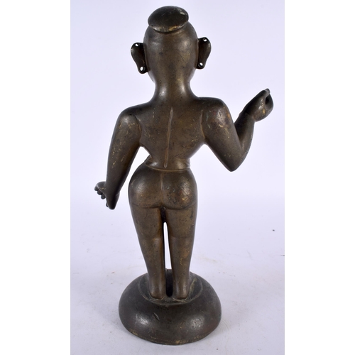 331 - A LOVELY 18TH CENTURY INDIAN BRONZE FIGURE OF A STANDING DEITY modelled nude with one hand raised. 2... 