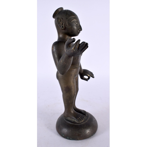 331 - A LOVELY 18TH CENTURY INDIAN BRONZE FIGURE OF A STANDING DEITY modelled nude with one hand raised. 2... 