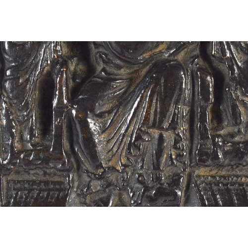 339 - A 17TH/18TH CENTURY EUROPEAN BRONZE PANEL OF A FEMALE SAINT modelled amongst other figures and build... 