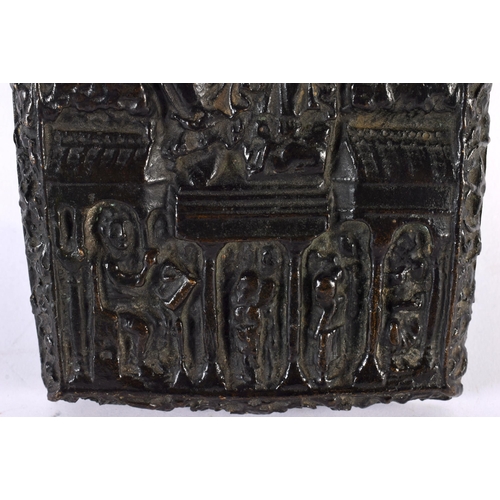 339 - A 17TH/18TH CENTURY EUROPEAN BRONZE PANEL OF A FEMALE SAINT modelled amongst other figures and build... 