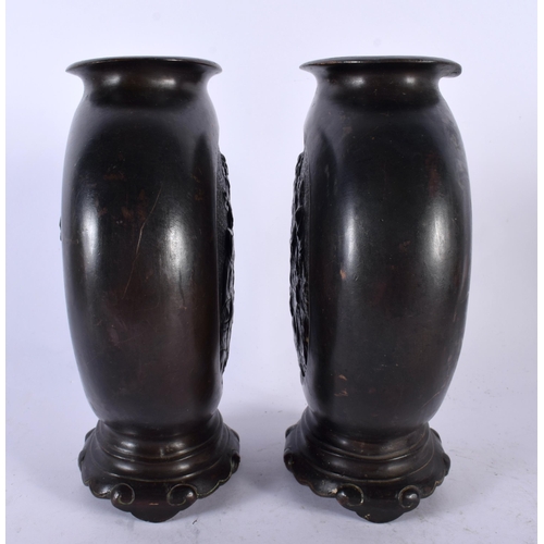 373 - A PAIR OF 19TH CENTURY CHINESE BRONZE PILGRIM MOON FLASKS Qing, decorative with immortals within a c... 