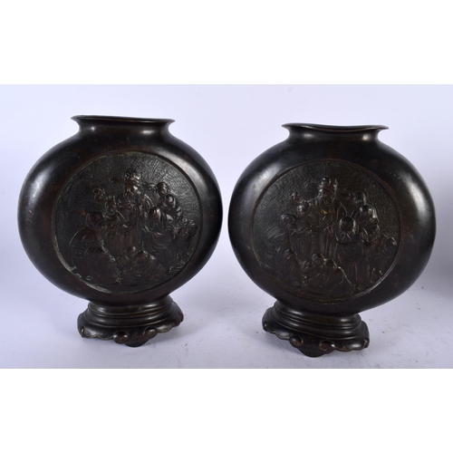 373 - A PAIR OF 19TH CENTURY CHINESE BRONZE PILGRIM MOON FLASKS Qing, decorative with immortals within a c... 