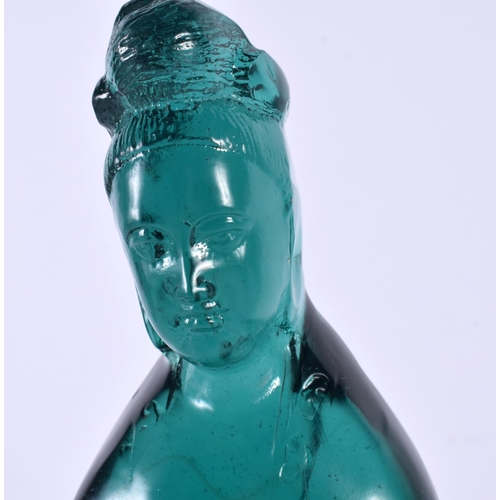 375 - A RARE CHINESE QING DYNASTY GREEN PEKING GLASS FIGURE OF AN IMMORTAL modelled upon a fitted hardwood... 