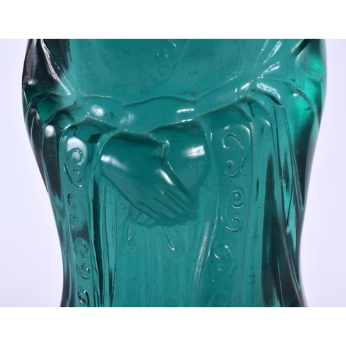 375 - A RARE CHINESE QING DYNASTY GREEN PEKING GLASS FIGURE OF AN IMMORTAL modelled upon a fitted hardwood... 