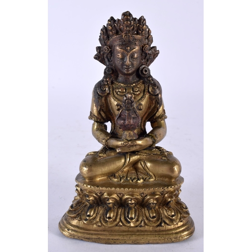 380 - A GOOD 17TH/18TH CENTURY CHINESE TIBETAN BRONZE FIGURE OF A BUDDHA Ming/Qing, modelled with hands cl... 