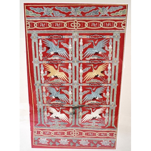 385 - AN UNUSUAL 19TH CENTURY CHINESE RED SILK EMBROIDERED EIGHT CRANE PANEL Qing. 54 cm x 44 cm.