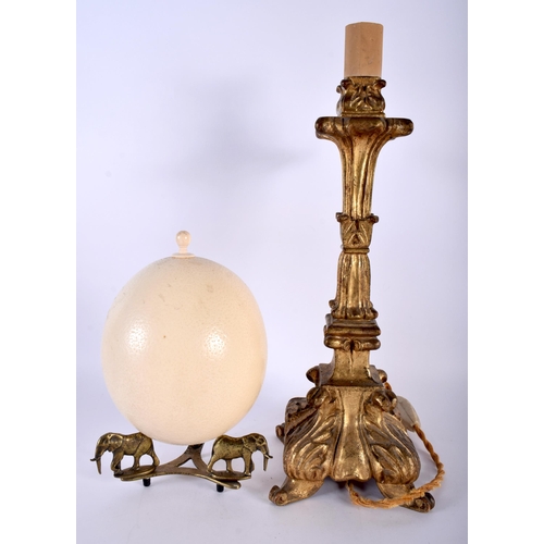 390 - AN 18TH/19TH CENTURY CONTINENTAL COUNTRY HOUSE GILTWOOD LAMP together with an Ostrich egg on elephan... 