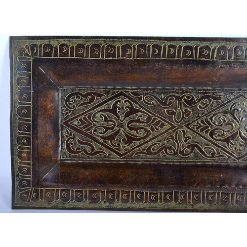 394 - A 17TH/18TH CENTURY PERSIAN MIDDLE EASTERN RECTANGULAR COPPER ALLOY TRAY engraved with motifs. 40 cm... 